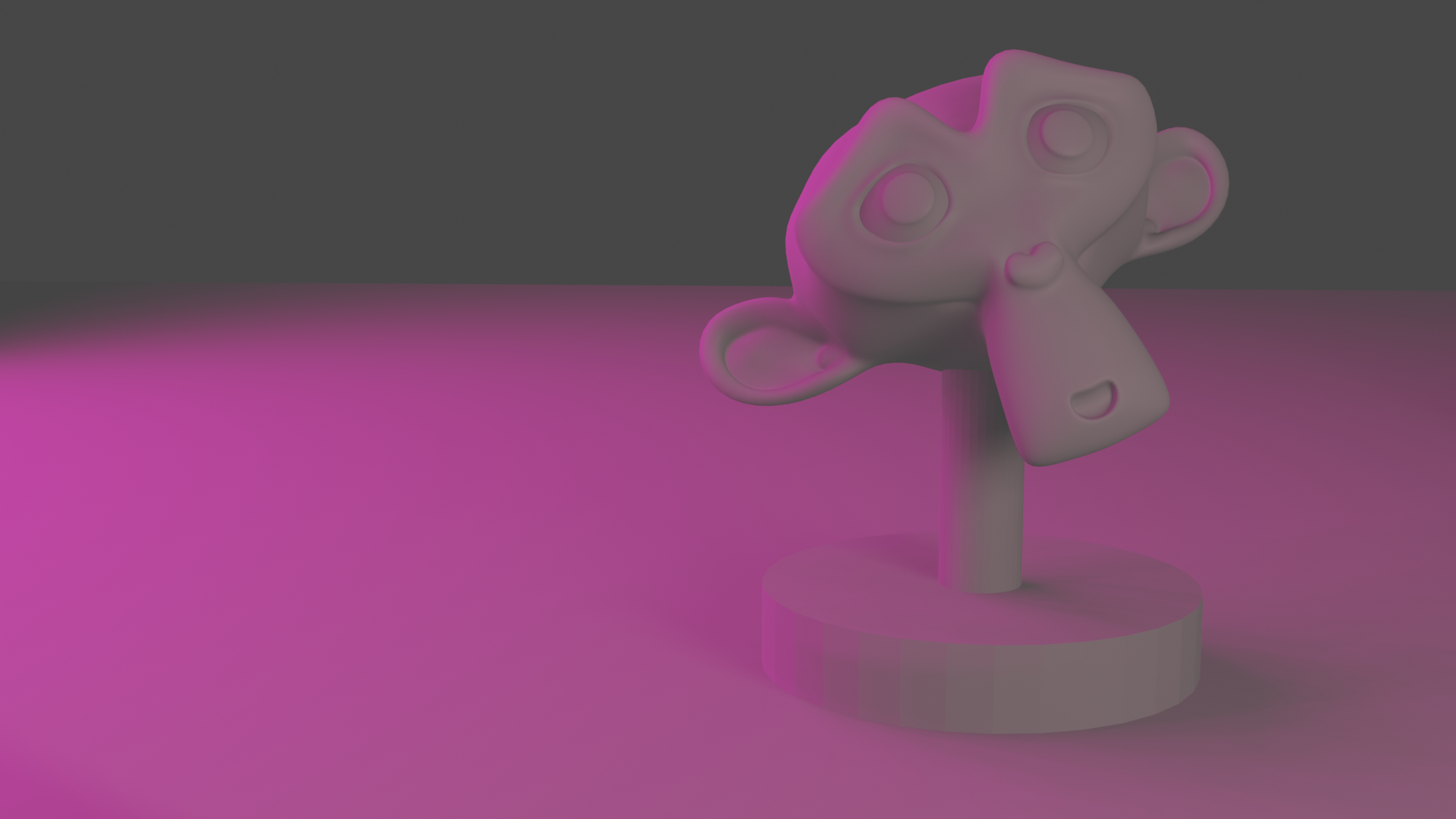 monkey sculpture in pink lighting